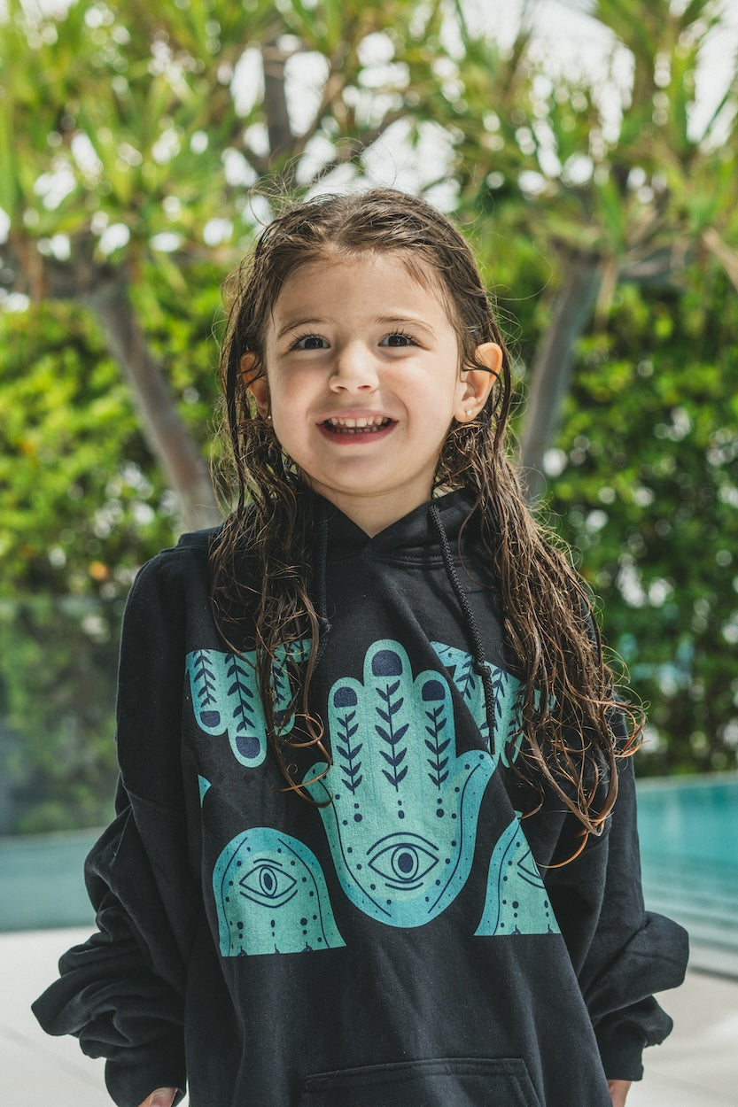 Hannah Bright Turquoise Hamsa Design Unisex Heavy Blend™ Hooded Sweatshirt