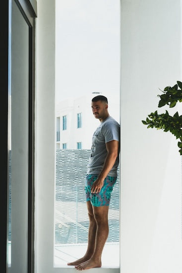 Hannah Bright Turquoise Hamsa Pattern on Grey Swim Trunks